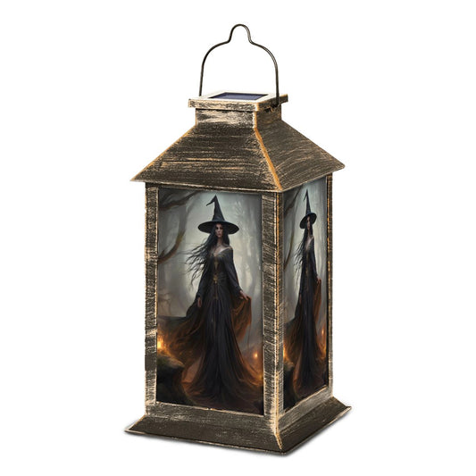Decorative lantern with a witch design on a white background