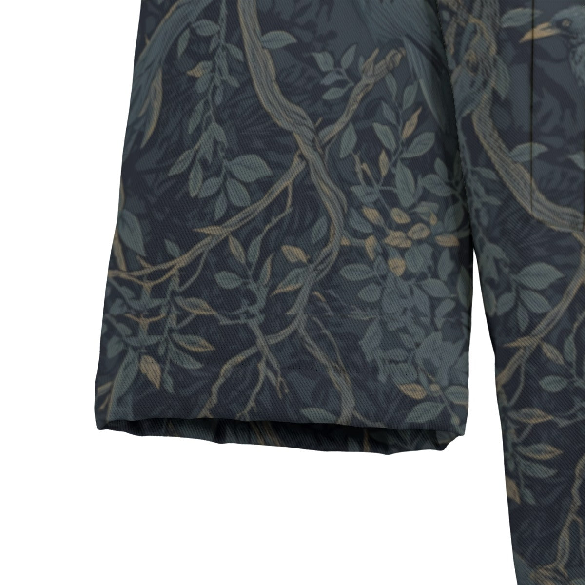 Dark fabric with nature-themed pattern of leaves and branches on a white background