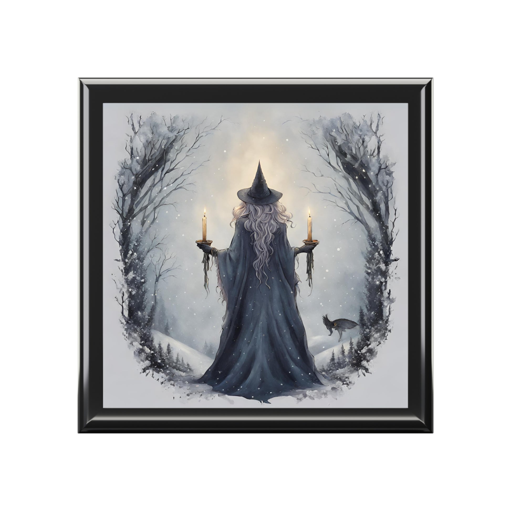 Framed artwork of a wizard in a snowy landscape with candles and a black frame.