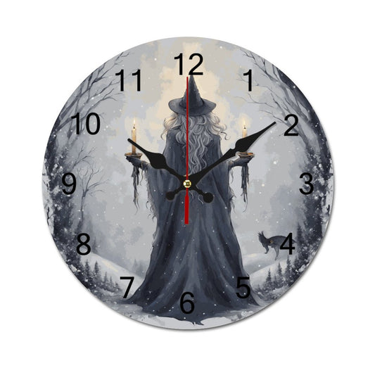 A wall clock featuring a winter scene with a wizard, trees, and a full moon. The wizard is depicted in the center with a black hat and coat, holding a wand.