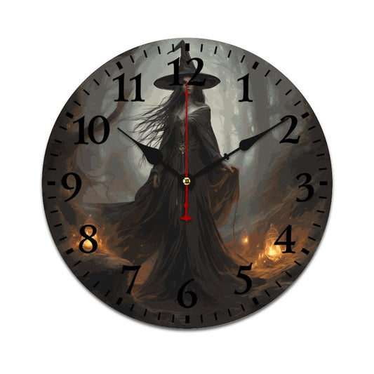 A wall clock featuring a black and white illustration of a person in a long black dress with a wide-brimmed hat, standing in a forest setting at night.