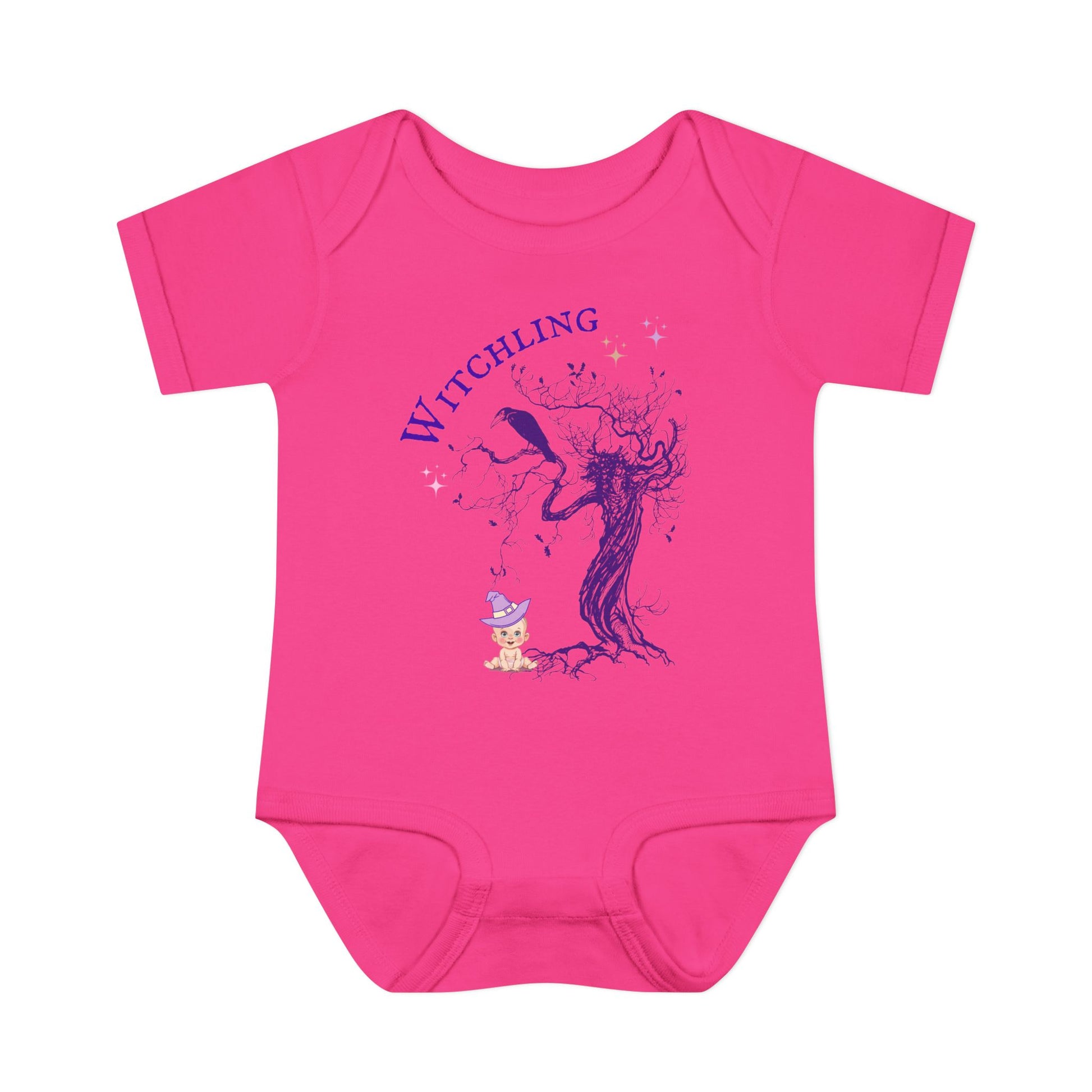 Pink baby onesie with a witch-themed design on a white background