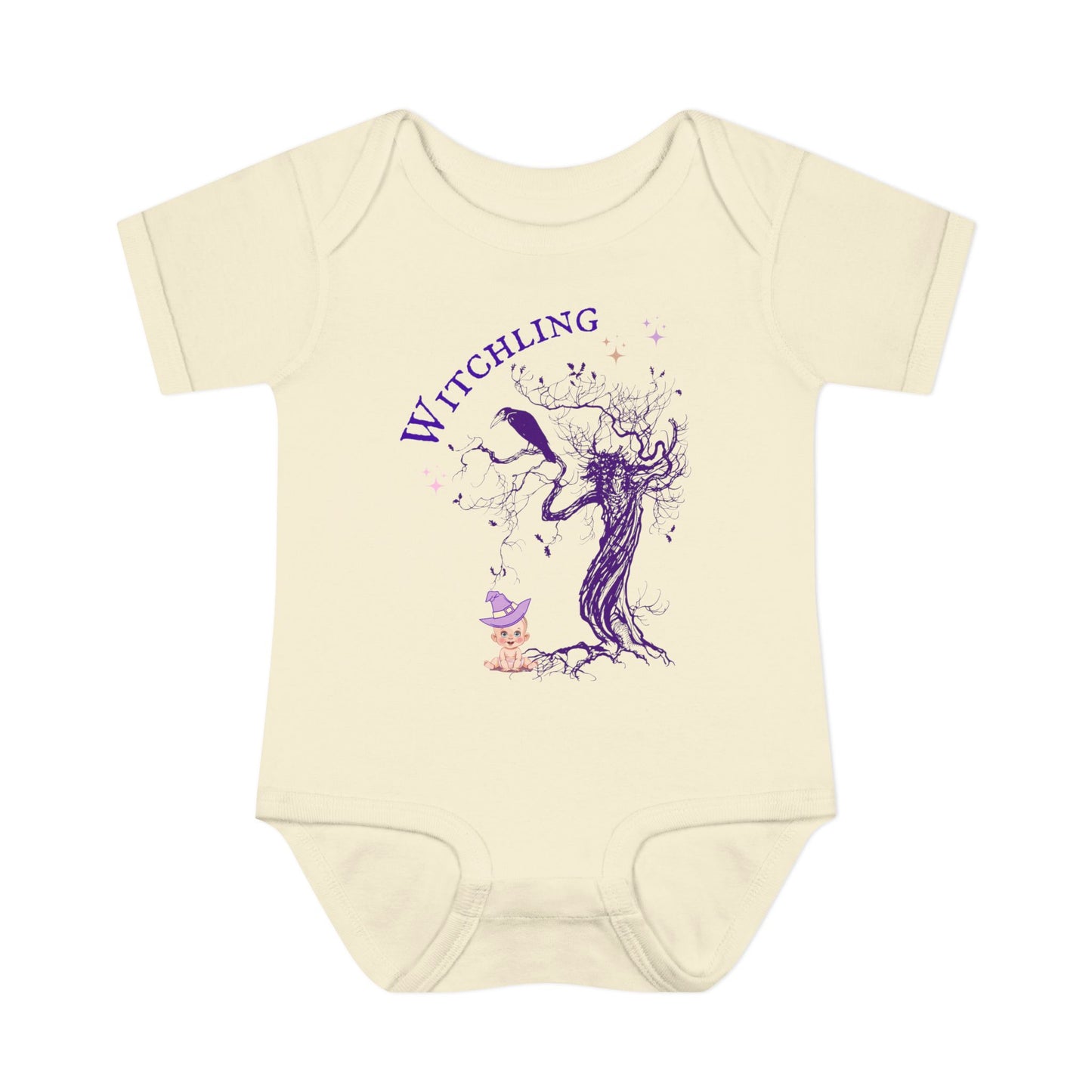 Beige baby onesie with a purple witch graphic and 'Witchling' text on a white background